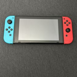 Nintendo Switch in original box, Green Travel Case and Super Mario Controller