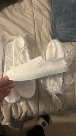 County Canvas slip ons and one Velcro pair