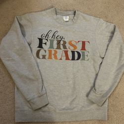 First Grade Teacher Crewneck and Hoodie Sweatshirts. Hardly Worn. Classroom. Size Medium. $25 each.