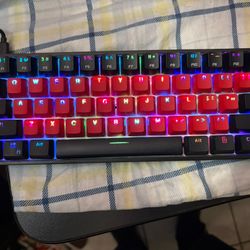 Kraken Pro 60 keyboard Gaming Keyboard Red and Black keys Comes with cord to plug into Compatible with PC, Mac, Xbox, and PlayStation. 