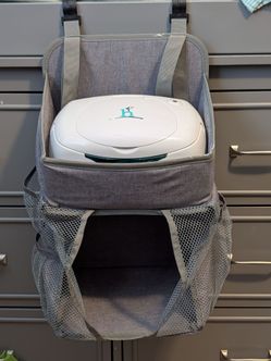Diaper caddy/wipe warmer