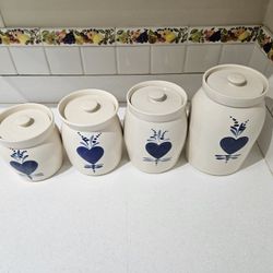 Set Of Four Stoneware Pottery Crock Canisters With Blue Heart Design