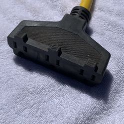 Prime Triple Tap Adapter extension cord.  Length: 2 feet.  Specifications: 12/3 gauge wire (12 AWG) rated for heavy-duty use, STW cable type.  Feature