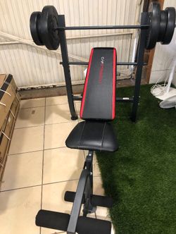 Gym Equipment bench press with 100lb weight set