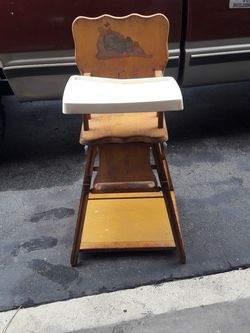 Vintage wooden high chair that converts into a rolling desk