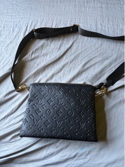 Authentic Louis Vuitton pouch/crossbody with a pink microfiber interior and gold-tone hardware