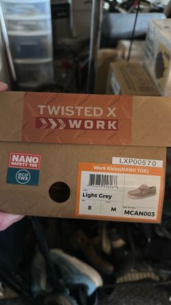 These are Twisted X Work Kicks in a "Light Grey" color.The shoes are designated as size 8 M (medium width).
