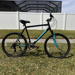 Black and Teal Mountain Bike  