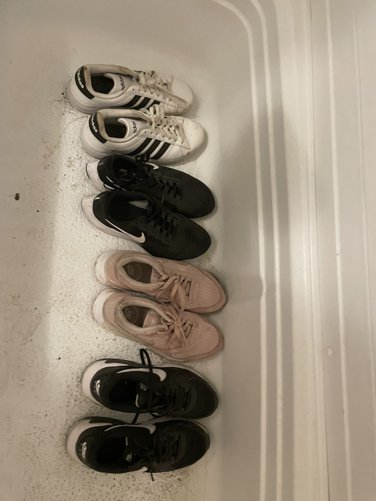 4 Pairs Of Tennis Shoes