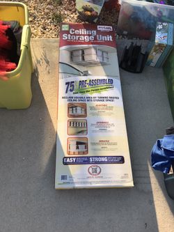 Ceiling storage unit brand new in box