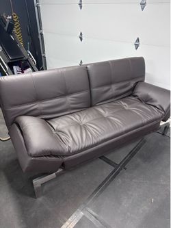 Faux leather couch/futon