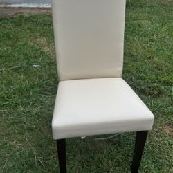 Four white chairs