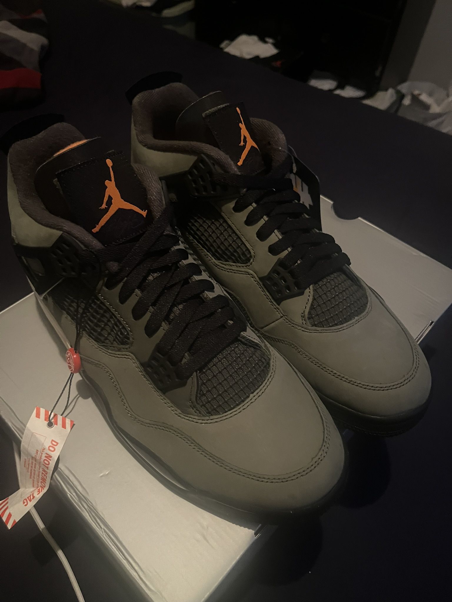 Authentic Jordan 4’s Undefeated