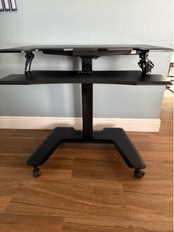 Black electric mobile height adjustable dual platform standing desk with wheels
