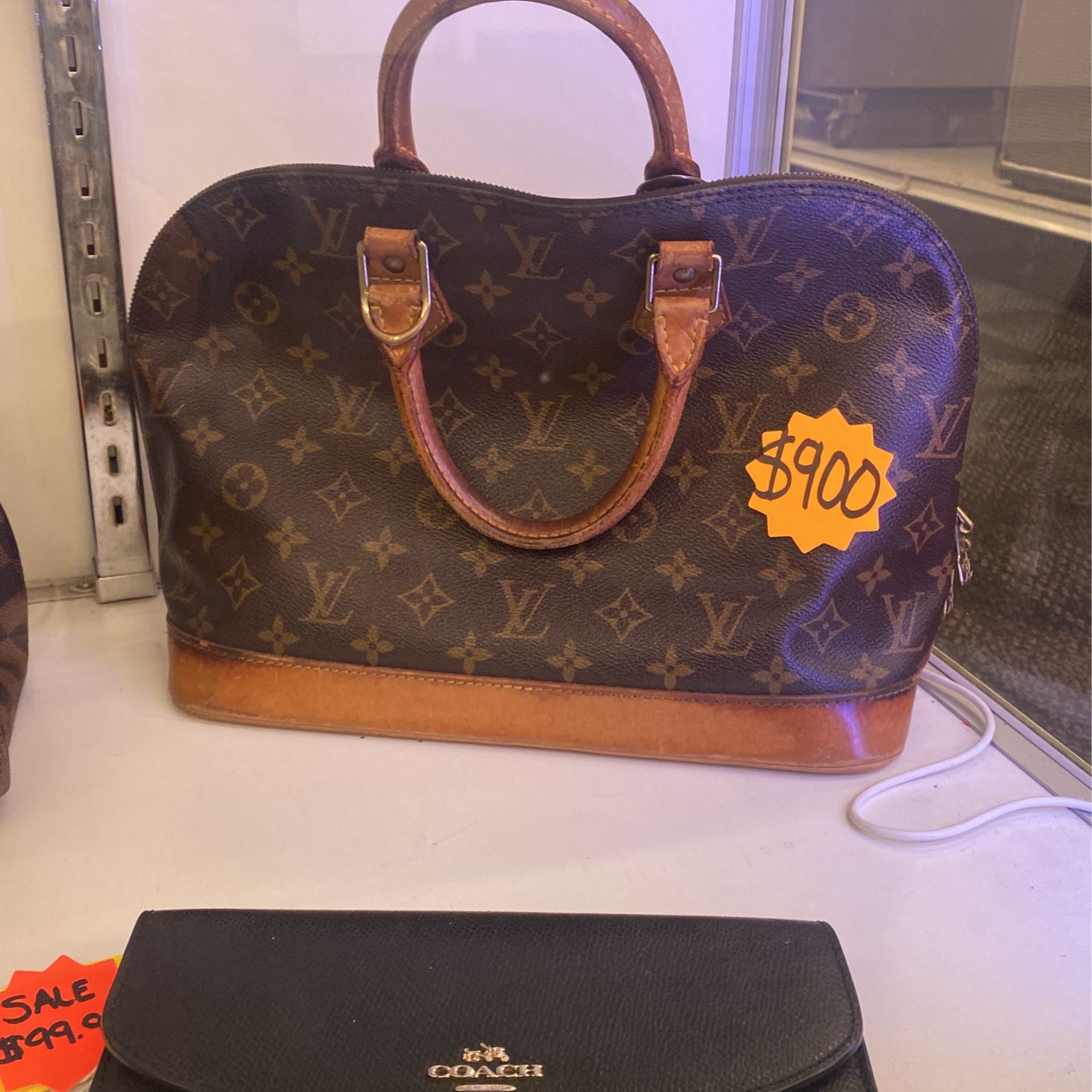 Louis Vuitton Hang Bag 