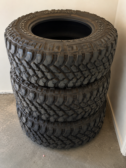 Set of 4 Firestone Destination M/T2 mud-terrain tires.