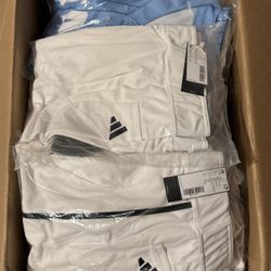 Lot of Nike and Adidas baseball pants and jerseys