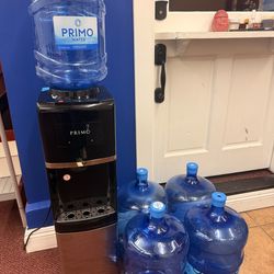 Water cooler with Five 5 Gallon bottles