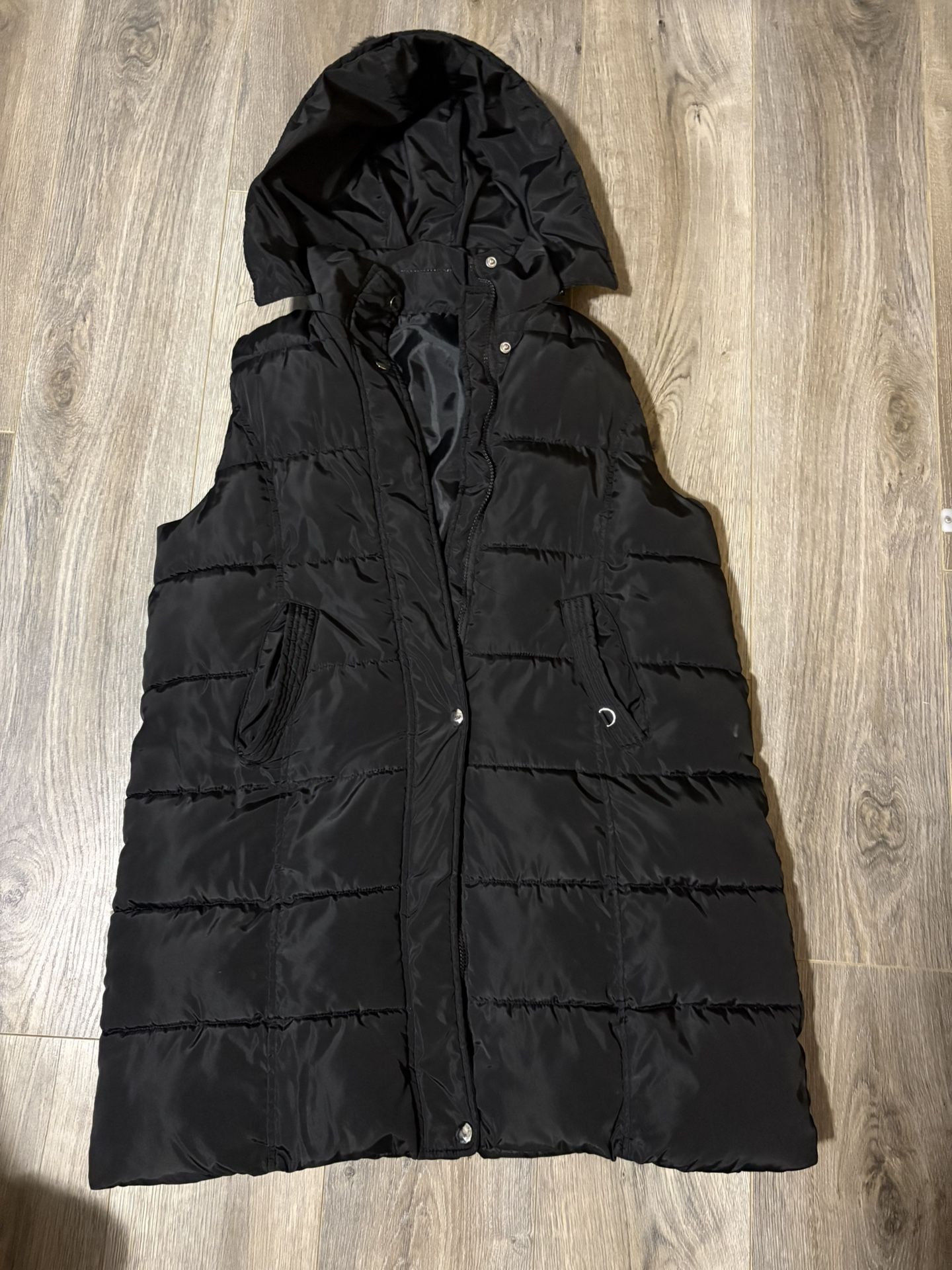 Long black hooded puffer vest. Sz Large Perfect for layering. Size large -