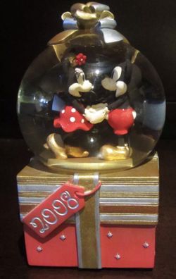Disney collectible snow globe retired