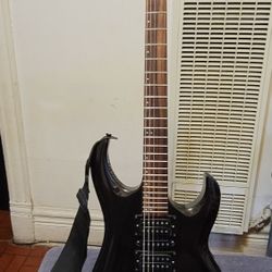 ARBOR ELECTRIC GUITAR MADE IN KOREA IN BLACK COLOR WITH FLOYD ROSE TREMOLO. 