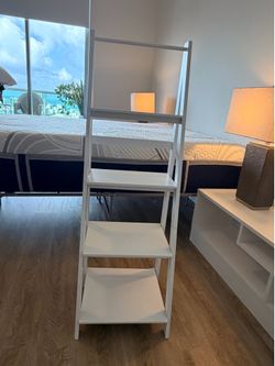 White stair step bookcase