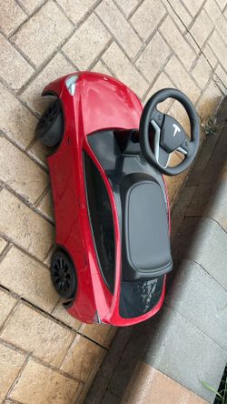 Ride on Tesla car