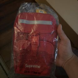 Red supreme camera bag