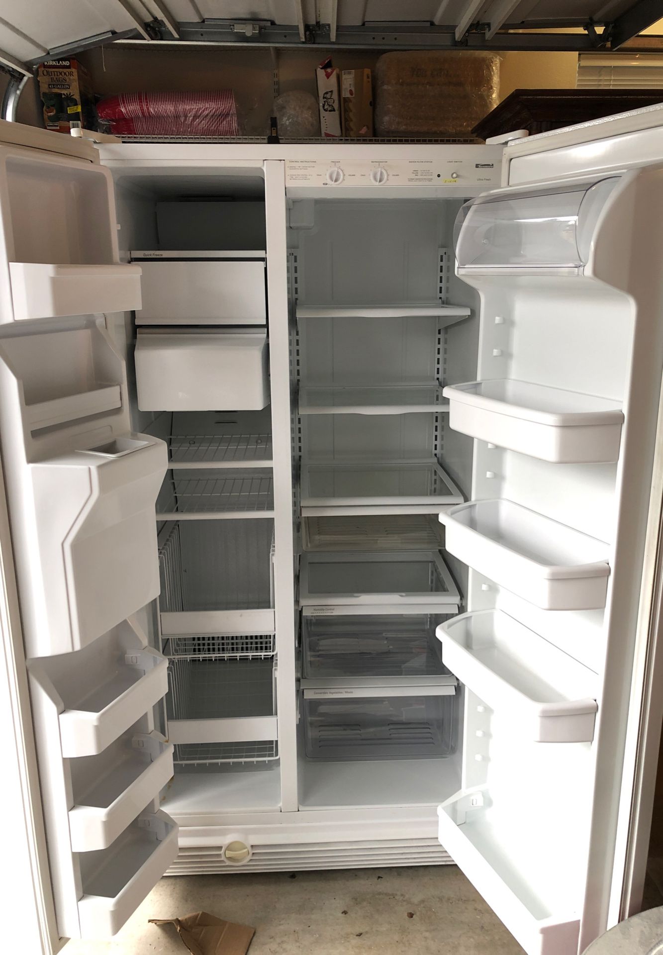 Kenmore refrigerator freezer with ice and water in the door