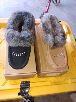 Women's moccasin slippers shoes both of them are size 9 black one and brown one