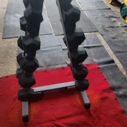 BODY SOLID   SETS. 8s.  10s. 15s  20. 25s. 30s.  RUBBER COATED HEXHEAD DUMBBELLS TOTAL 216LBs  BODY SOLID  STEEL A-FRAME DUMBBELL RACK  HOLDS 6 SETS
1