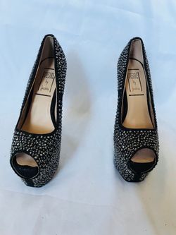 Pair of black peep-toe heels