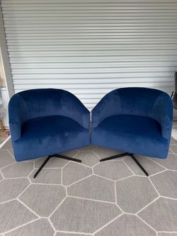 2 Swivel Blue Velvet Chairs by Drexel - Model home furniture