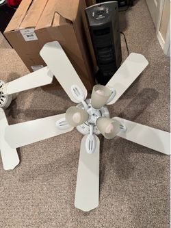 Hampton Bay white ceiling fan and light. 5 paddles and 3 lights