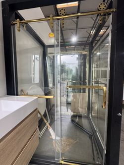 60 in. W x 76 in. H Single Sliding Frameless Shower Door in Gold with 5/16 in. Tempered Glass #210  Approximate Max Installed Width (in.) 61.42 in. Do