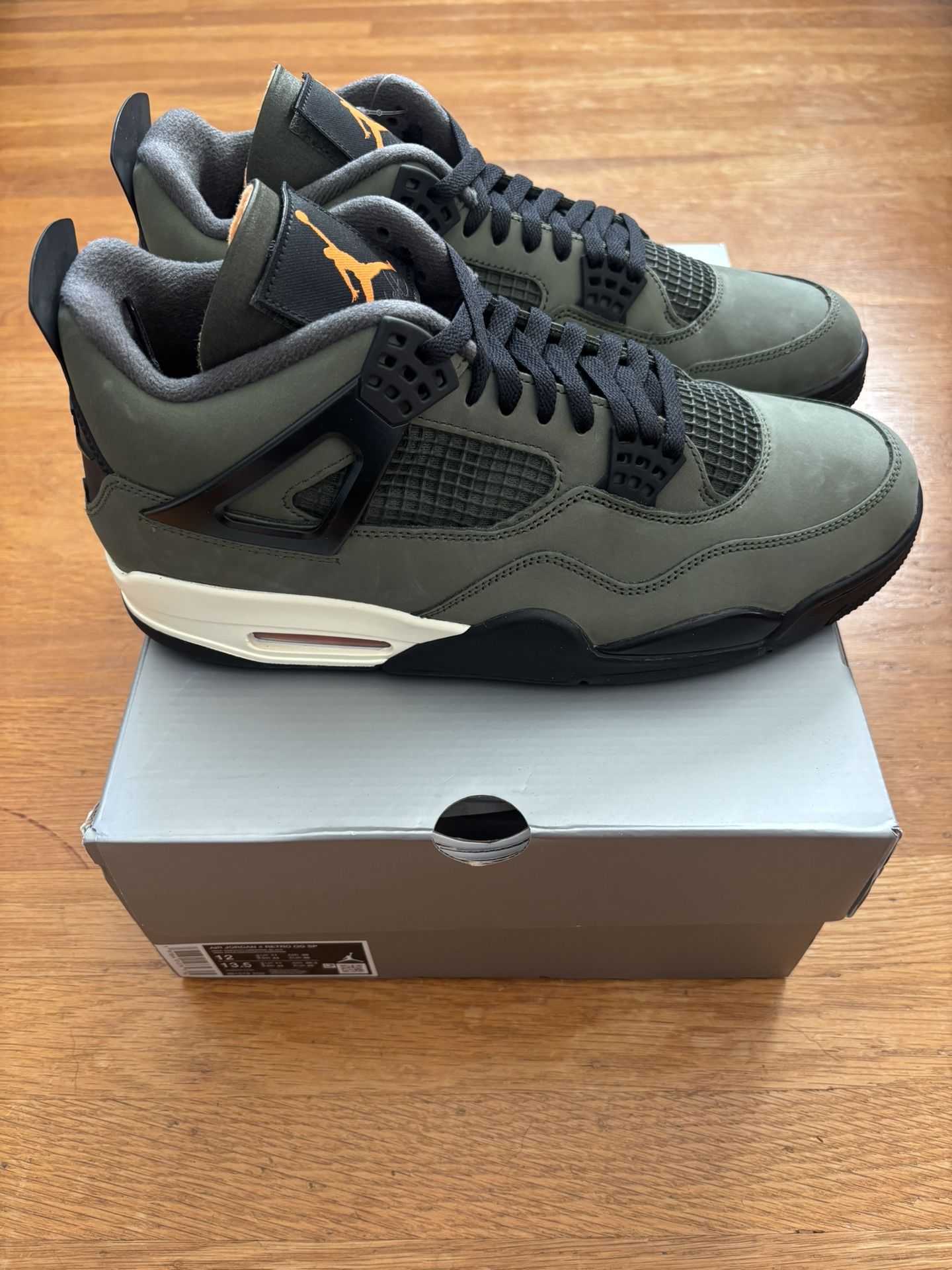 Sz. 12, 13, 14, 15 Jordan 4 Undefeated New Price Varies Depending on Size