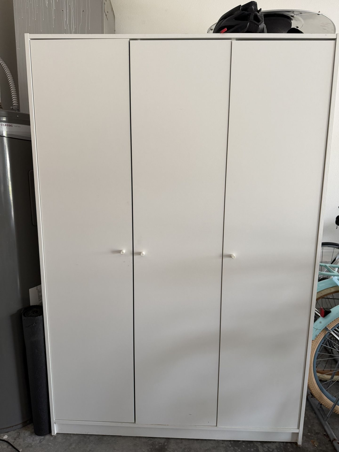 Three-door wardrobe