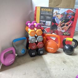 complete set of 5,8,10,12,15lb neoprene dumbbells and 5,10,15 and 30lb ketebbell, and floor