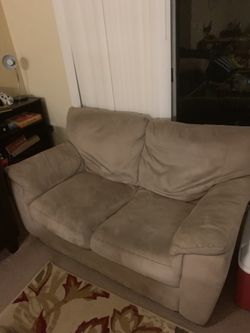 Tan loveseat sofa
