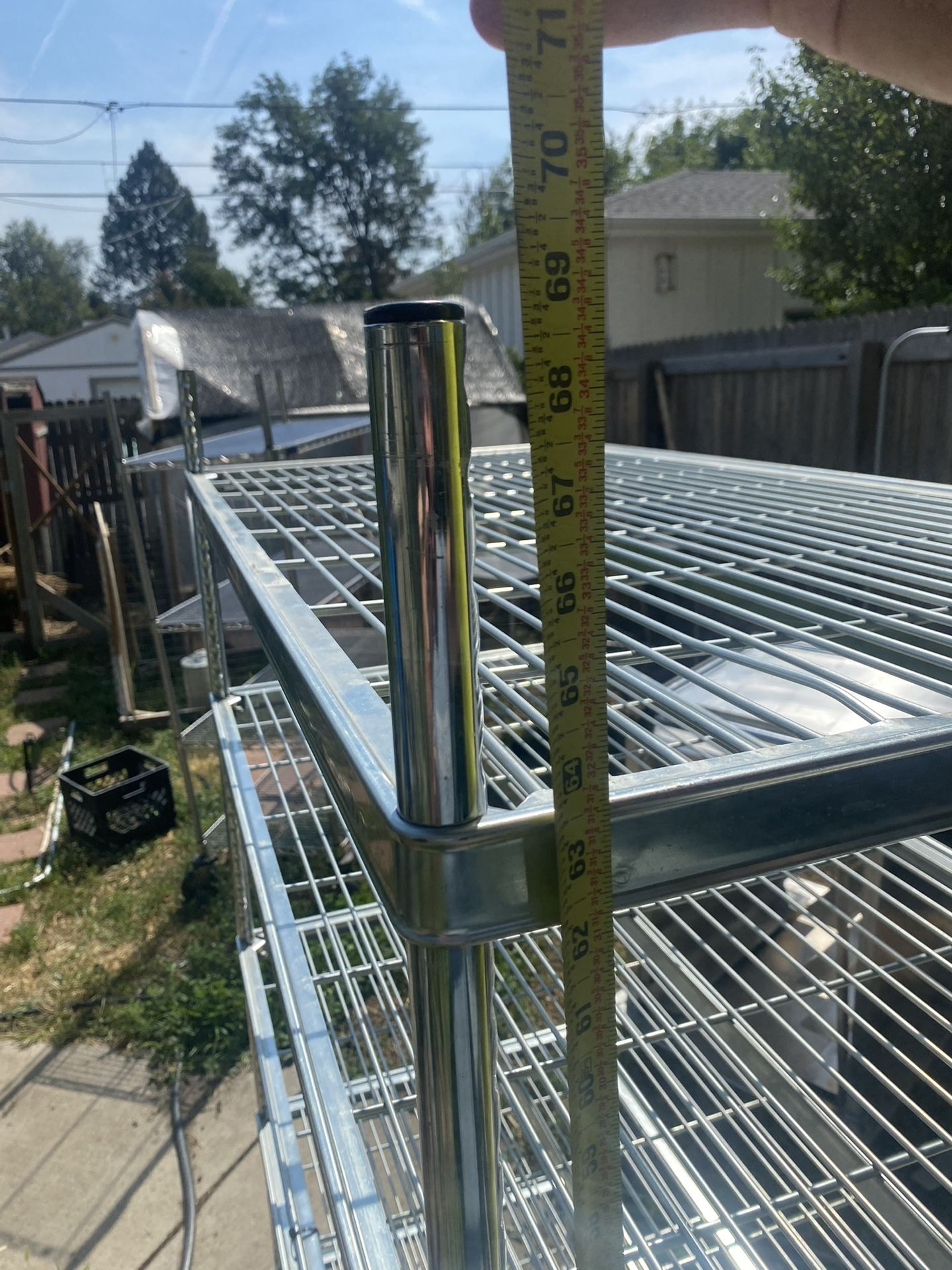 Metal five shelf rack with wheels