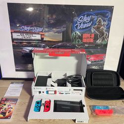 NINTENDO SWITCH LIKE BRAND NEW! It Comes With 1 Case + 1 Game + Dock + Joycons + Controller Holder + Box + Charger + Joycon Protector + Headphones