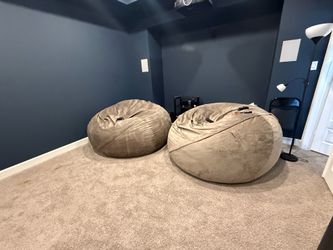 Lovesac bean bags. Never broke them in.