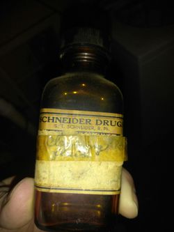 Antique glass medicine bottle