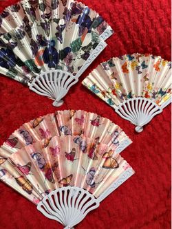 Hand held butterfly fans