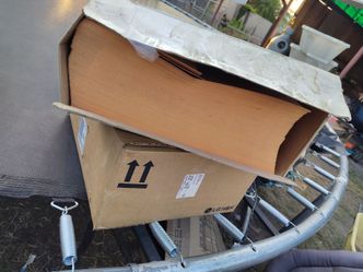 Box of yellow envelopes and some copy paper