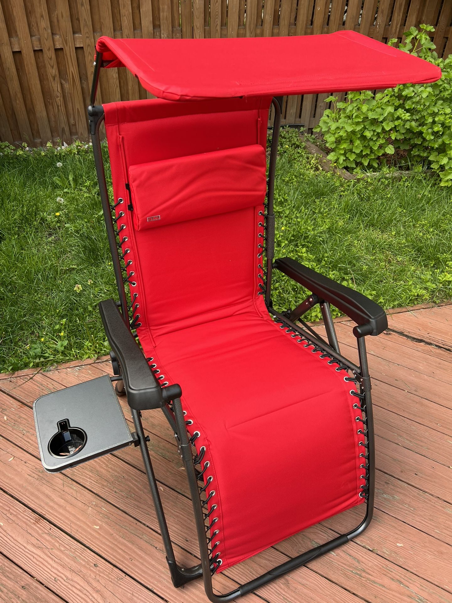 Beach chair with canopy shade, drink holder, storage pouch.