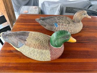 Male and female hand carved wooden duct decoy Male and female hand carved wooden duck decoys