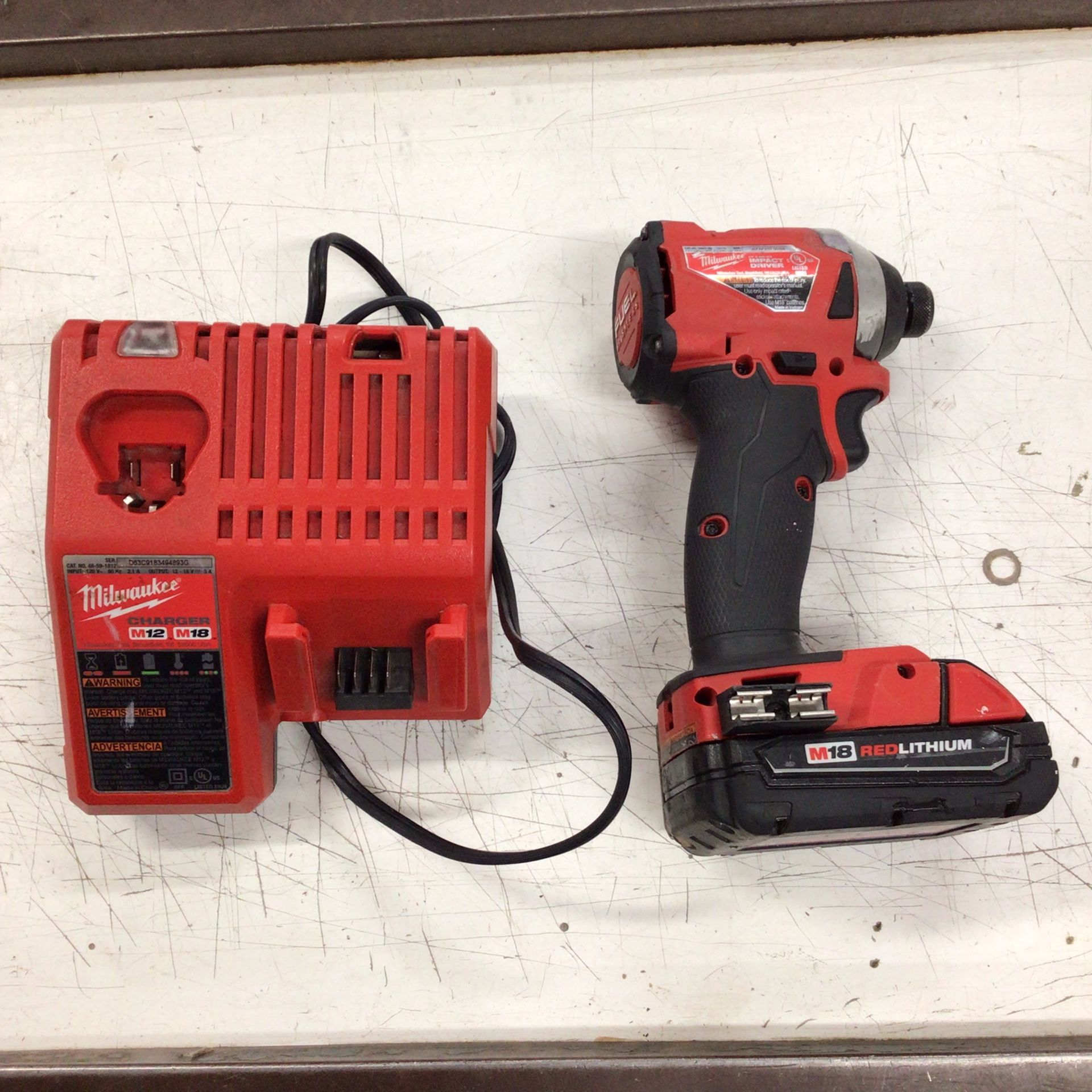 Milwaukee M18 FUEL 18V Lithium-Ion Brushless Cordless 1/4 in. Hex Impact Driver, M18 Battery, M12/18 Charger (Tool, Charger, and Battery)