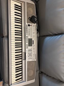Used Yamaha portable Grand DGX-300