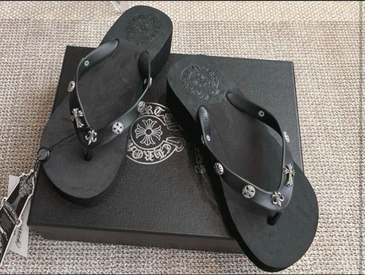 Chrome Hearts Black And Pink Flip Flops with Silver Floral Details.